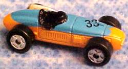 Blue does not extend all the way back, '33' on cowl at positive angle