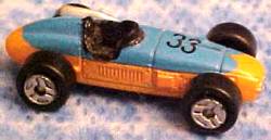 Blue does not extend all the way back, '33' on cowl at negative angle